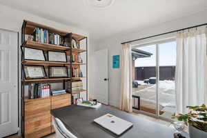 Office area featuring wood finished floors and baseboards