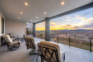 Exterior space featuring a mountain view and recessed lighting