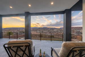 Interior space with recessed lighting and a mountain view