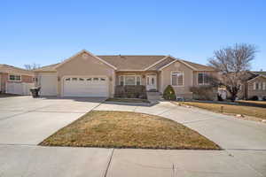 Ranch-style home with stucco siding