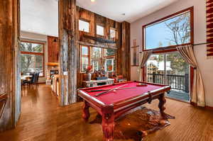 Playroom with hardwood / wood-style flooring, billiards, and recessed lighting