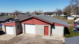 Detached garage with a residential view