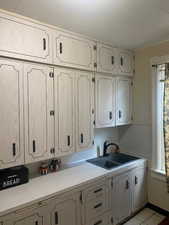 Kitchen with light cabinets