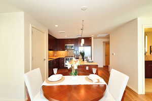 Dining room featuring light wood-style floors