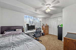 Private Bedroom View #2 - Bedroom featuring a textured ceiling, a closet, carpet, and a ceiling fan