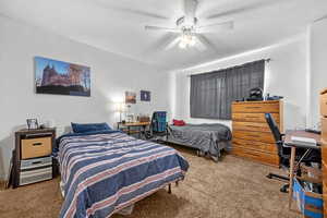 Shared Bedroom - Carpeted bedroom featuring a ceiling fan