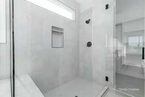 Bathroom with a shower stall