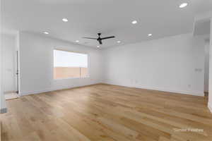 Unfurnished room featuring baseboards, ceiling fan, recessed lighting, and light wood-style floors