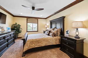 Bedroom with carpet, recessed lighting, ornamental molding, ceiling fan, and baseboards