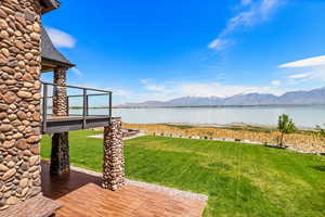 View of yard featuring a water and mountain view