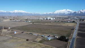 View of mountain feature with a rural view with Commercial Warehouse in the background