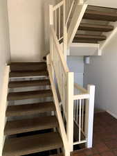 Public staircase with carpet floor