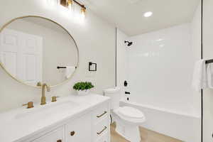 ADU Master bath with shower / bath combination, vanity with storage, and new toilet