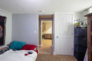 Bedroom featuring light tile patterned flooring