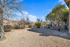 View of yard featuring central air condition unit