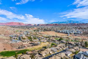 Drone / aerial view with a residential view and a mountain view