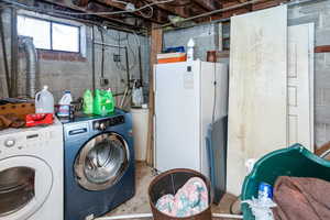 Laundry room featuring laundry area and washing machine and dryer