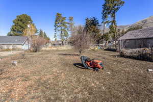 View of yard featuring fence