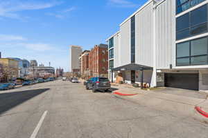 View of road with curbs and sidewalks