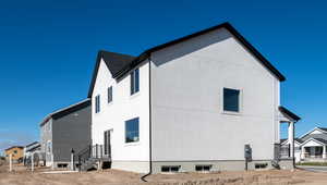 View of property exterior featuring a residential view