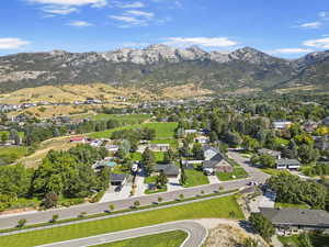 Drone / aerial view featuring a residential view and a mountain view