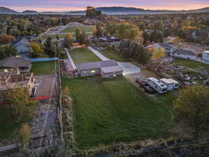 Birds eye view of property featuring a residential view and a mountain view