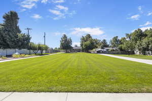 View of yard with fence