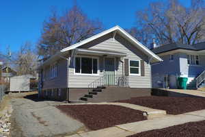 View of front facade featuring an outbuilding