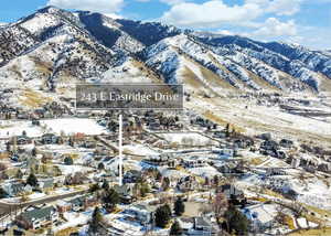 Property view of mountains featuring a residential view