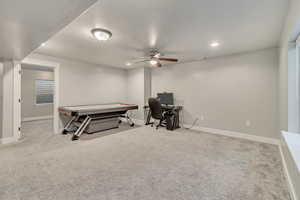 Recreation room with baseboards, carpet flooring, and recessed lighting