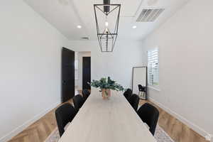 Dining space with recessed lighting, visible vents, and baseboards