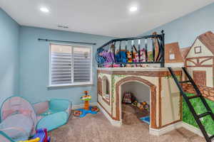 Playroom featuring carpet, visible vents, baseboards, and recessed lighting