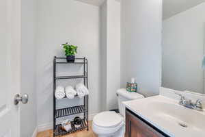 Bathroom with vanity and toilet