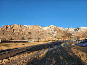 Property view of mountains from front Yard