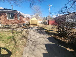 1 car soft sided Garage, and brick siding