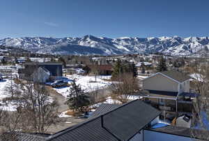 Property view of mountains featuring a residential view