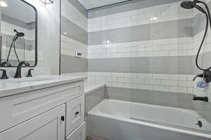 Full bath with  shower combination and vanity