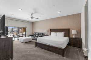 Bedroom with recessed lighting, a ceiling fan, baseboards, access to exterior, and carpet