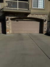 Garage featuring driveway