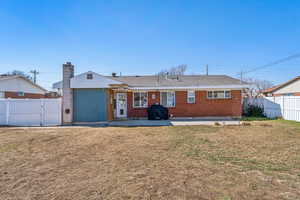 View of the back of home featuring a patio area