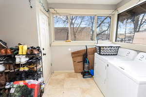 Clothes washing area with laundry area and washing machine and dryer