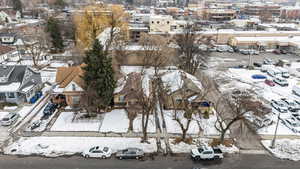 Snowy aerial view featuring a residential view