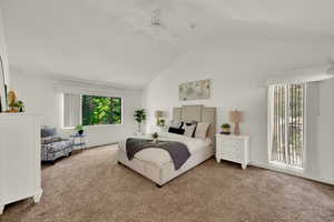 Main Bedroom with carpet and vaulted ceiling