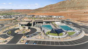 Birds eye view of property with a residential view and a mountain view