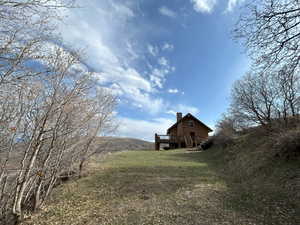 View of yard featuring a wooden deck