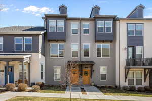 Townhome / multi-family property with stucco siding