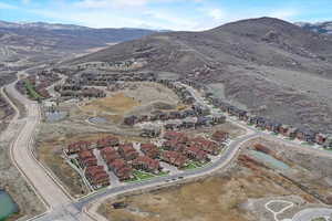 Drone / aerial view with a residential view and a mountain view