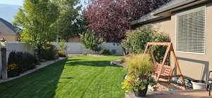View of yard featuring a fenced backyard