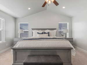 Bedroom featuring recessed lighting, a ceiling fan, light carpet, vaulted ceiling, and baseboards