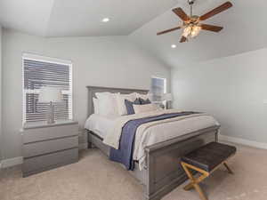 Bedroom featuring carpet, recessed lighting, vaulted ceiling, ceiling fan, and baseboards